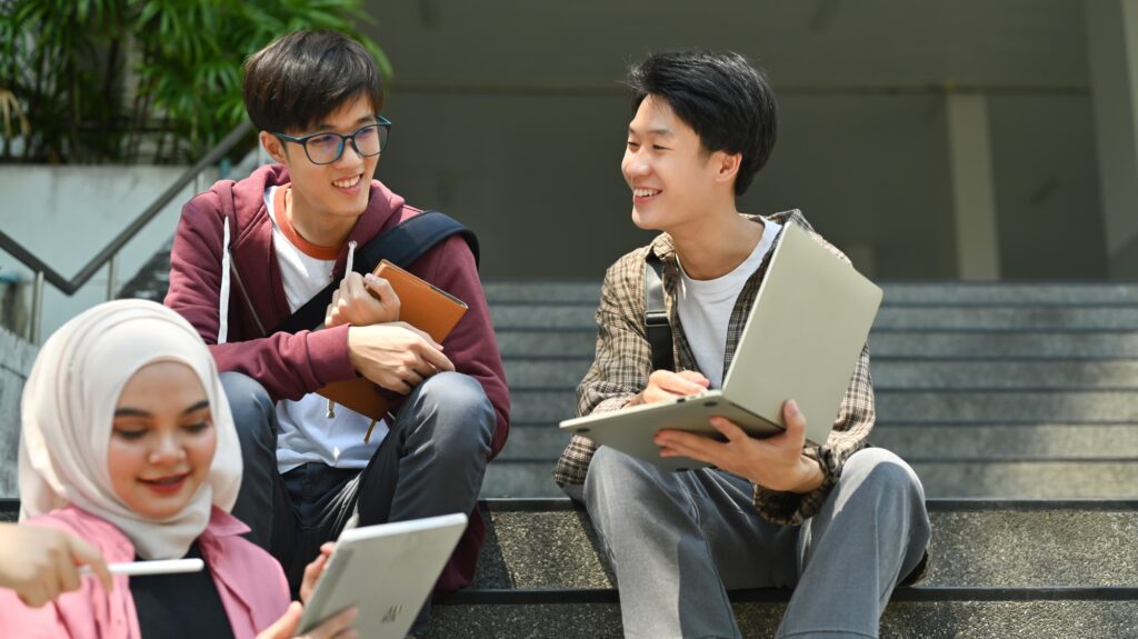 Group of students are working on academic project or preparing for exam together.